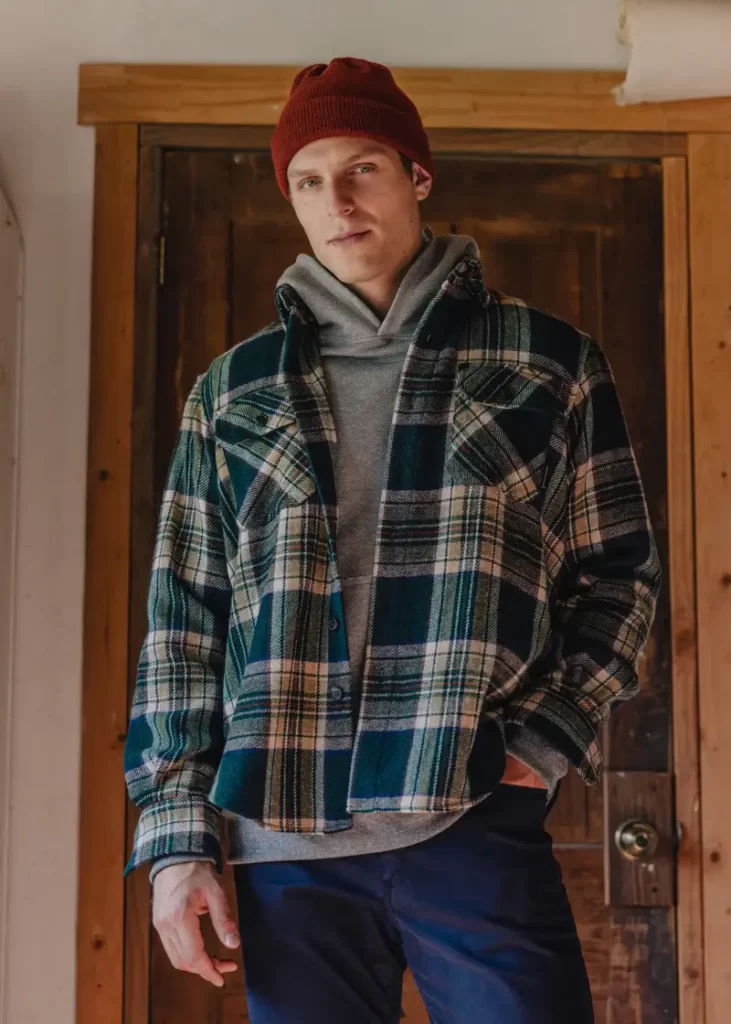 Man wearing an American Trench hoodie and overshirt