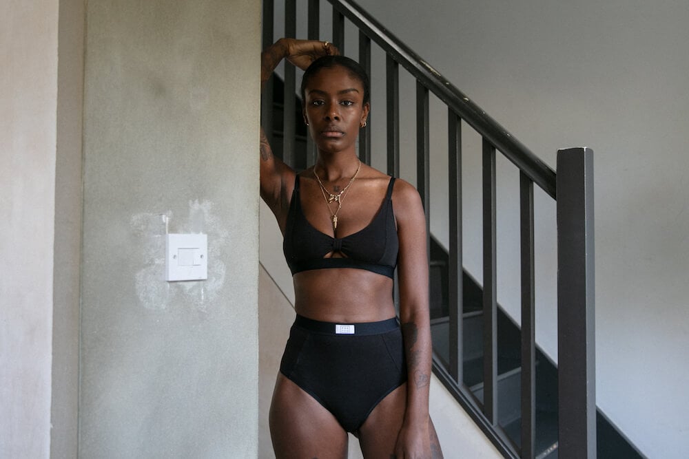 Model in pantee bralette and pants