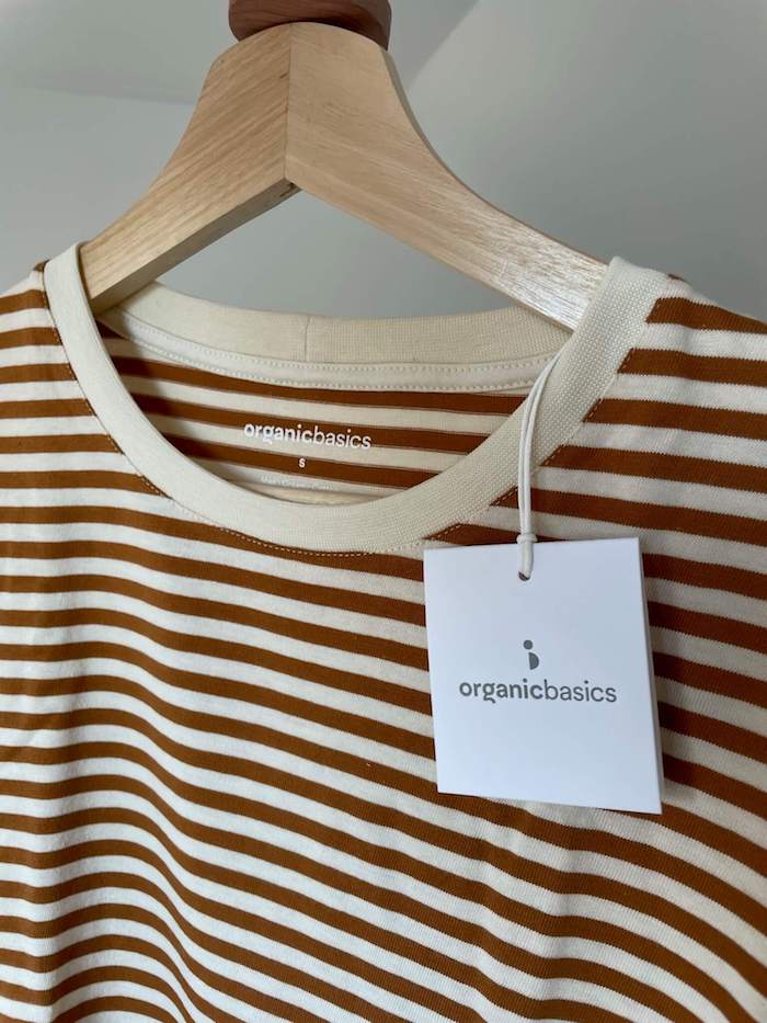 Organic Basics close up organic T shirt in Ocre Stripe